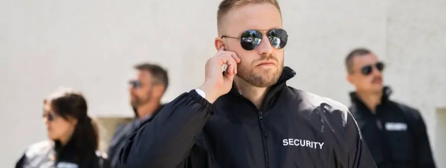 four security guard looking around