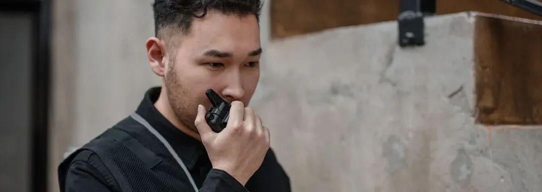 security guard on walkie talkie