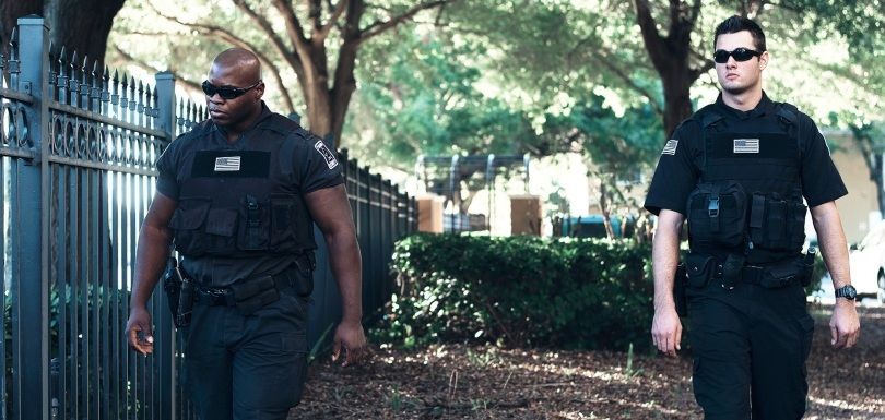 Security Officers doing a patrol round in a park