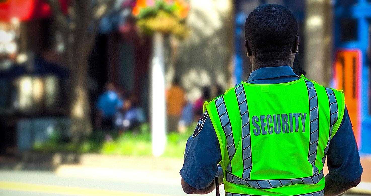 Security Guard Patrolling City Park